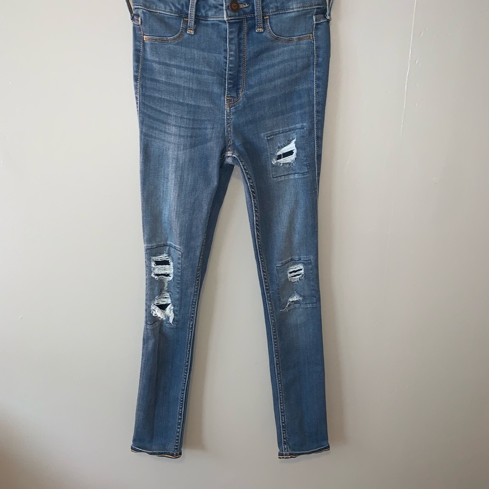 Medium wash patched jeans